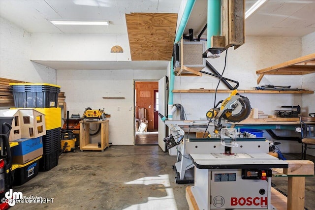 garage with a workshop area