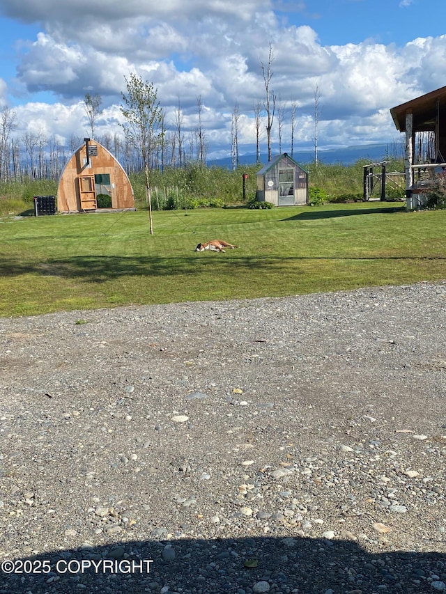 exterior space featuring gravel driveway