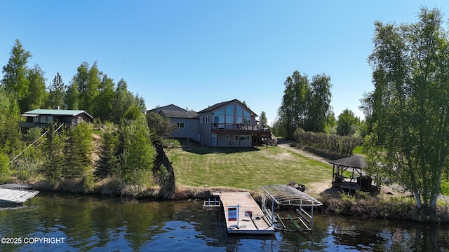 3583 S Peninsula Dr, Wasilla, AK 99623 - dock featuring a lawn, a gazebo, stairs, and a deck with water view