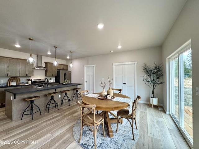 698 Wortham Ave, Kenai, AK 99611 - dining room featuring recessed lighting and light wood finished floors