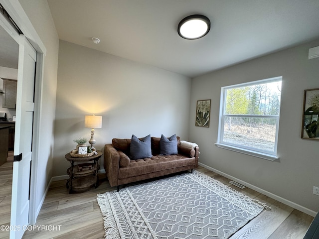 698 Wortham Ave, Kenai, AK 99611 - living room with light wood-style flooring