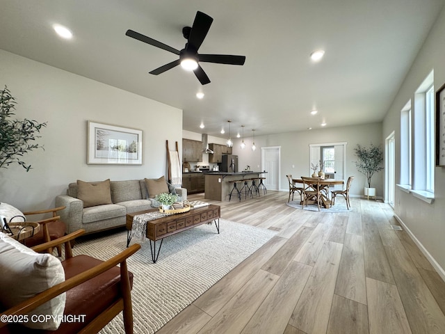 698 Wortham Ave, Kenai, AK 99611 - living area with light wood-style floors, ceiling fan, and recessed lighting