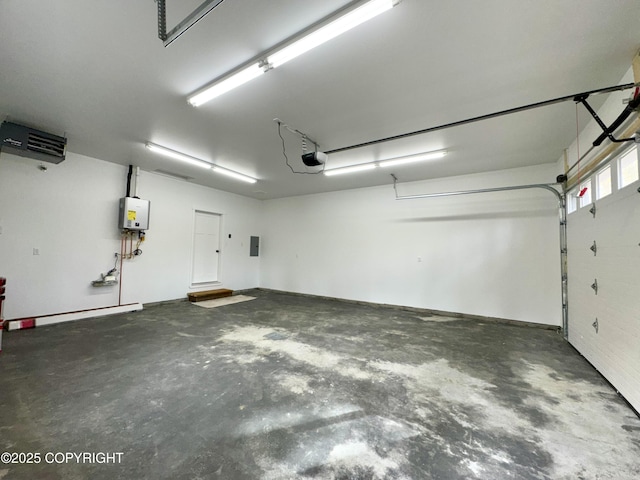 698 Wortham Ave, Kenai, AK 99611 - garage featuring a garage door opener