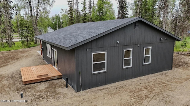 698 Wortham Ave, Kenai, AK 99611 - view of outbuilding featuring view of wooded area