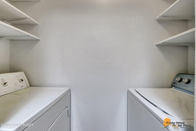 laundry room with washer and clothes dryer