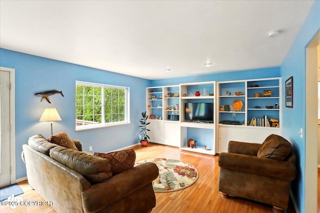 19016 Mountain Point Cir, Eagle River, AK 99577 - living room featuring wood finished floors and baseboards