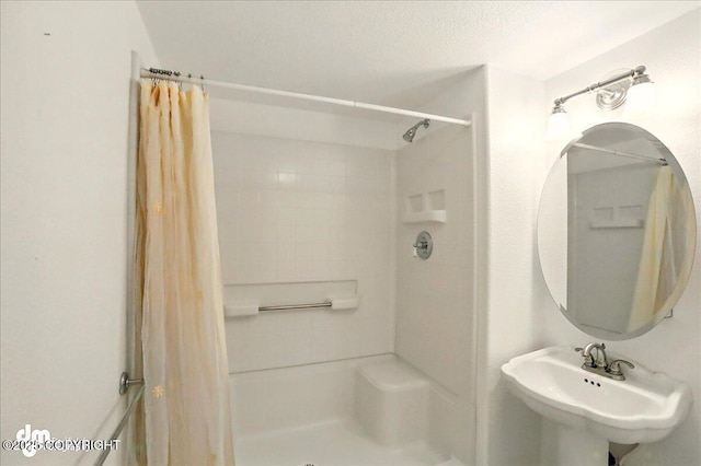 19016 Mountain Point Cir, Eagle River, AK 99577 - full bath featuring a stall shower and a sink