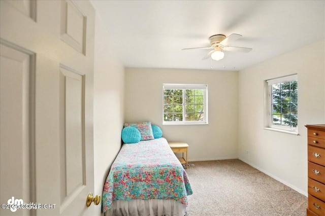 19016 Mountain Point Cir, Eagle River, AK 99577 - bedroom featuring carpet floors, baseboards, and a ceiling fan
