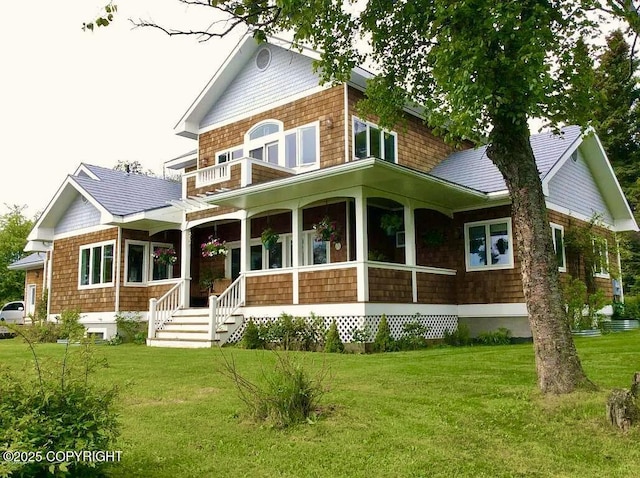 2727 Kachemak Dr, Homer, AK 99603 - back of house with a balcony and a lawn