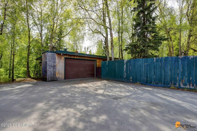 204 E 15th Ave, Anchorage, AK 99501 - garage with asphalt driveway