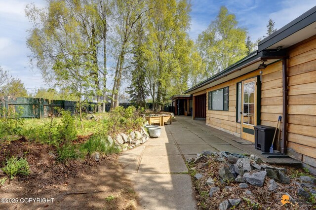 204 E 15th Ave, Anchorage, AK 99501 - fenced backyard with a patio
