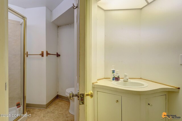 204 E 15th Ave, Anchorage, AK 99501 - full bathroom featuring toilet, vanity, and a shower