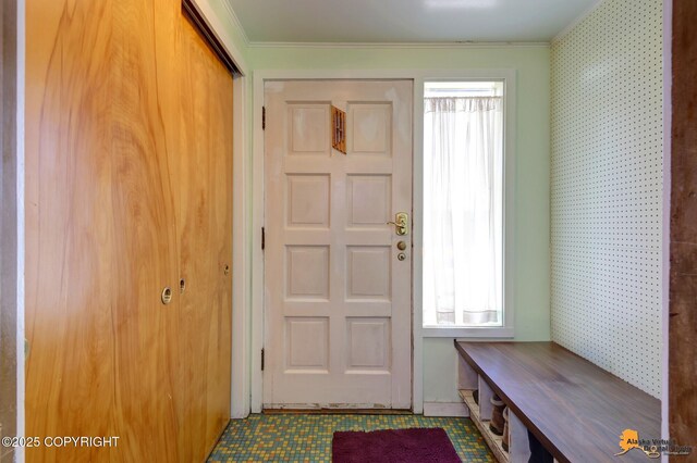 204 E 15th Ave, Anchorage, AK 99501 - entryway with healthy amount of natural light, wallpapered walls, and ornamental molding