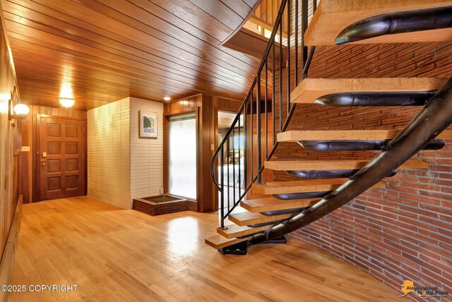 204 E 15th Ave, Anchorage, AK 99501 - stairs featuring wood ceiling, wood finished floors, and wood walls