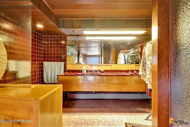 204 E 15th Ave, Anchorage, AK 99501 - full bathroom featuring a baseboard radiator and vanity