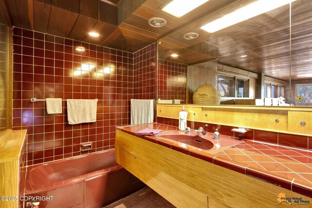 204 E 15th Ave, Anchorage, AK 99501 - full bathroom featuring a tub, vanity, and wooden ceiling