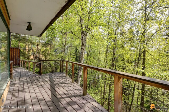 204 E 15th Ave, Anchorage, AK 99501 - deck featuring a view of trees
