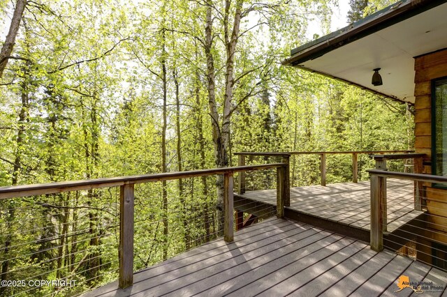 204 E 15th Ave, Anchorage, AK 99501 - deck featuring a wooded view