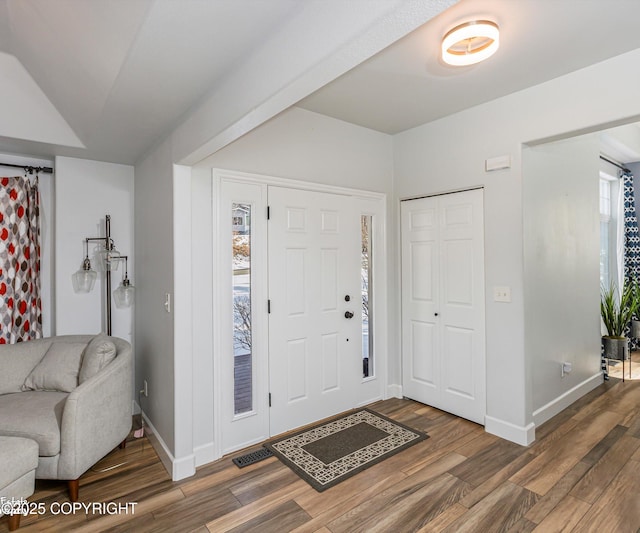 25656 Bendilent Cir, Eagle River, AK 99577 - entryway featuring wood finished floors, baseboards, and visible vents