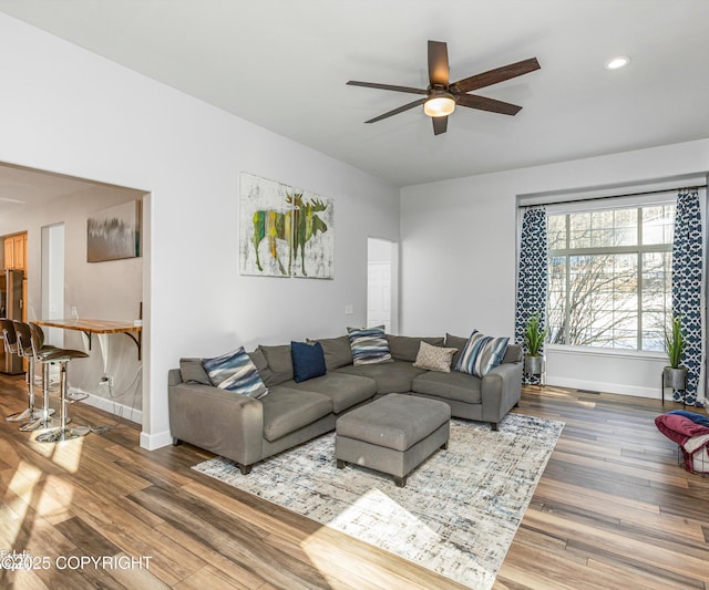 25656 Bendilent Cir, Eagle River, AK 99577 - living room featuring recessed lighting, baseboards, a ceiling fan, and wood finished floors