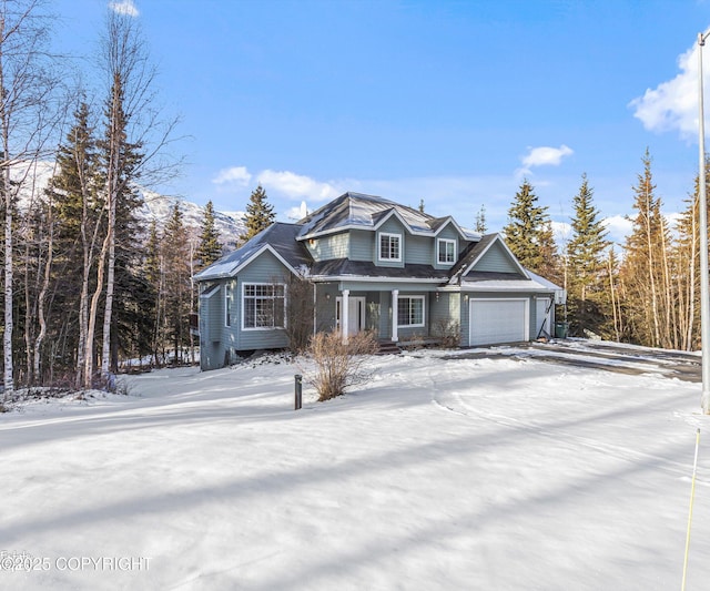 25656 Bendilent Cir, Eagle River, AK 99577 - view of front facade with a garage