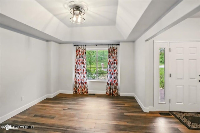25656 Bendilent Cir, Eagle River, AK 99577 - entrance foyer with wood finished floors, a raised ceiling, and baseboards