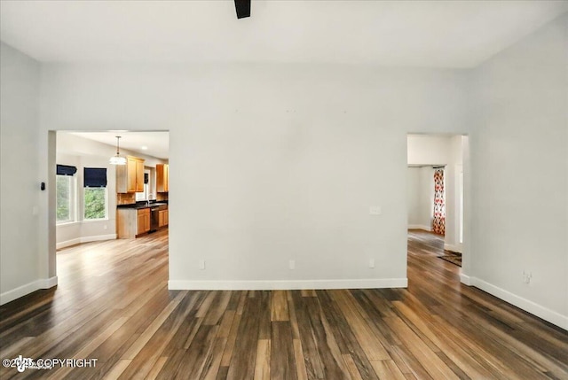 25656 Bendilent Cir, Eagle River, AK 99577 - spare room with dark wood finished floors and baseboards