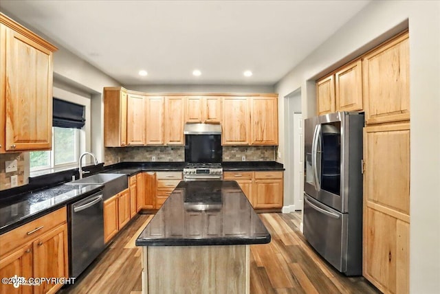 25656 Bendilent Cir, Eagle River, AK 99577 - kitchen featuring stainless steel appliances, under cabinet range hood, a sink, light brown cabinets, and recessed lighting
