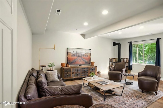25656 Bendilent Cir, Eagle River, AK 99577 - living area featuring wood finished floors, recessed lighting, and beam ceiling
