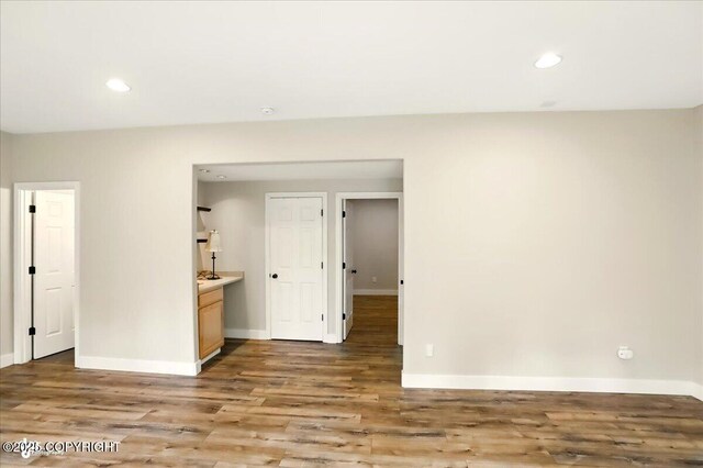 25656 Bendilent Cir, Eagle River, AK 99577 - empty room featuring wood finished floors, baseboards, and recessed lighting