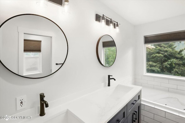 25656 Bendilent Cir, Eagle River, AK 99577 - full bathroom with double vanity and tiled tub