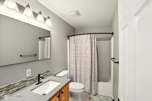 25656 Bendilent Cir, Eagle River, AK 99577 - bathroom featuring vanity, toilet, and shower / tub combo
