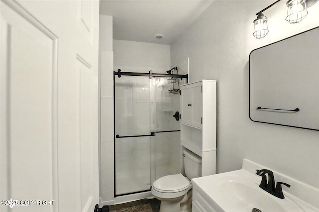 25656 Bendilent Cir, Eagle River, AK 99577 - full bathroom with a shower stall, toilet, and vanity