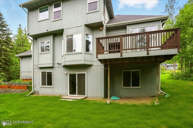 25656 Bendilent Cir, Eagle River, AK 99577 - back of property with a lawn and a deck