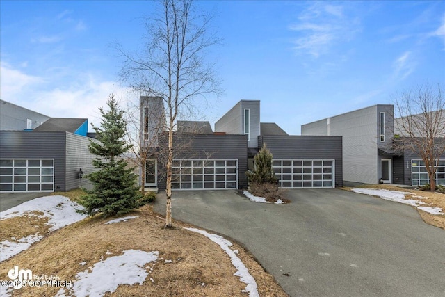 1382 Northbluff Dr # 4B, Anchorage, AK 99501 - contemporary house with driveway and a garage