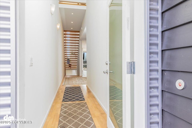 1382 Northbluff Dr # 4B, Anchorage, AK 99501 - hallway featuring baseboards, wood finished floors, and recessed lighting