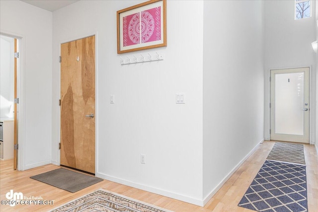 1382 Northbluff Dr # 4B, Anchorage, AK 99501 - entrance foyer with light wood-type flooring and baseboards