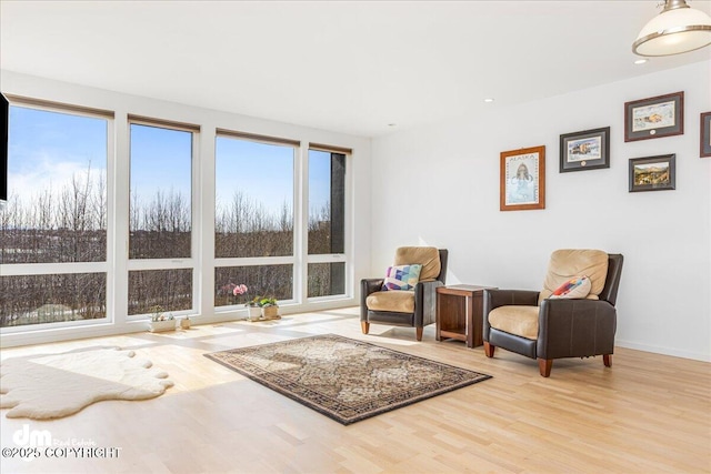 1382 Northbluff Dr # 4B, Anchorage, AK 99501 - living area featuring recessed lighting, wood finished floors, and baseboards