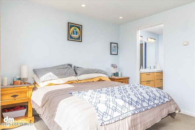 1382 Northbluff Dr # 4B, Anchorage, AK 99501 - bedroom with baseboards, carpet flooring, ensuite bathroom, and recessed lighting
