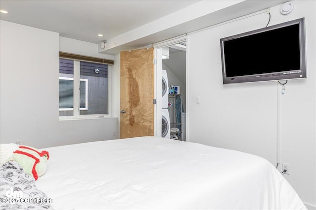 1382 Northbluff Dr # 4B, Anchorage, AK 99501 - bedroom featuring stacked washer / drying machine and recessed lighting
