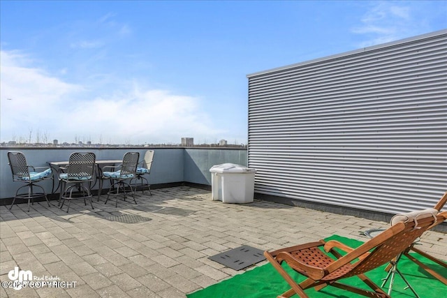 1382 Northbluff Dr # 4B, Anchorage, AK 99501 - view of patio featuring outdoor dining area