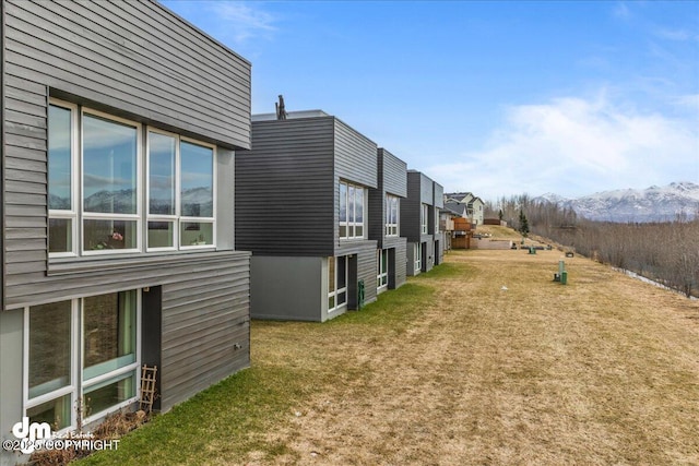 1382 Northbluff Dr # 4B, Anchorage, AK 99501 - exterior space featuring a mountain view and a yard