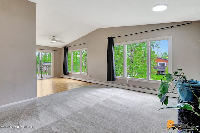 8400 E 11th Ct, Anchorage, AK 99504 - unfurnished room with carpet flooring, vaulted ceiling, ceiling fan, baseboards, and a baseboard radiator