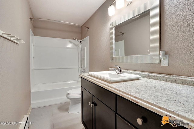 8400 E 11th Ct, Anchorage, AK 99504 - full bath with a textured wall, vanity, toilet, tub / shower combination, and a baseboard heating unit