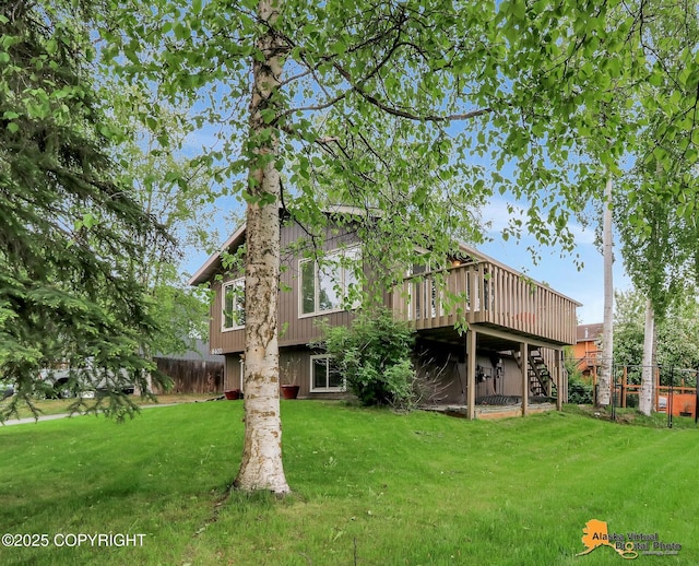 8400 E 11th Ct, Anchorage, AK 99504 - back of house featuring stairway and a deck