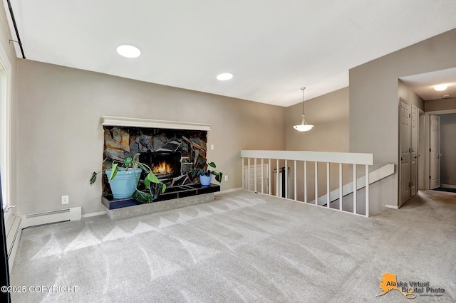 8400 E 11th Ct, Anchorage, AK 99504 - unfurnished living room featuring carpet, baseboards, and baseboard heating