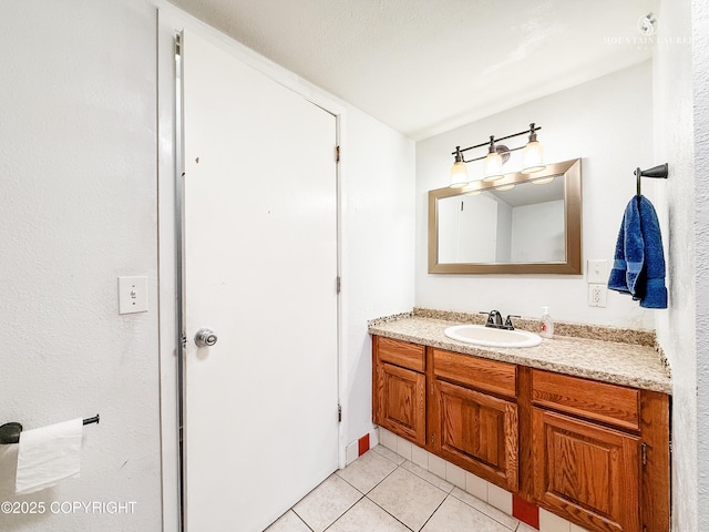 6934 Inlet Vista Dr, Wasilla, AK 99623 - bathroom with vanity and tile patterned flooring