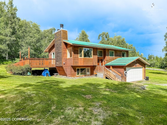 6934 Inlet Vista Dr, Wasilla, AK 99623 - back of house featuring a chimney, a lawn, a wooden deck, stairway, and a metal roof