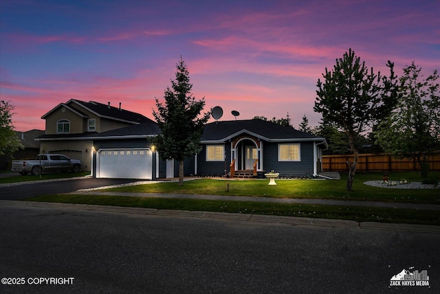 11510 Tulin Park Loop, Anchorage, AK 99516 - ranch-style house with an attached garage and asphalt driveway