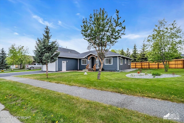 11510 Tulin Park Loop, Anchorage, AK 99516 - single story home featuring an attached garage, asphalt driveway, and entry steps